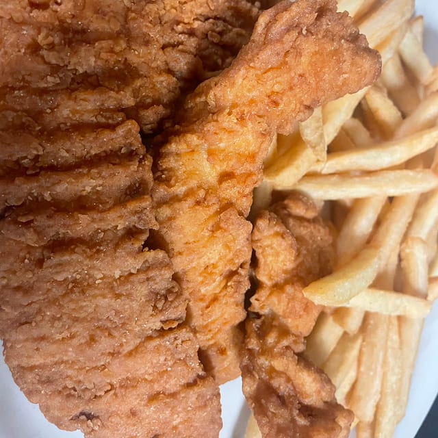 Tossed Chicken Tenders w/ Fries.